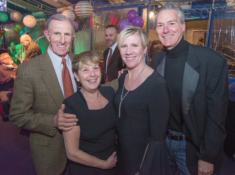 Sussex Academy Foundation supporter Joseph Schell, left, poses with (l-r) Patricia Oliphant, director of curriculum; Jennifer Scott, vice president; and Allen Stafford, director of finance. BY DENY HOWETH